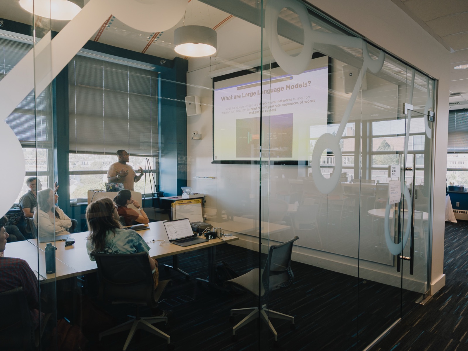 Cordero teaching a session on large language model fundamentals at the University of Washington